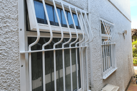 Bespoke fixed belly bars allow windows to open